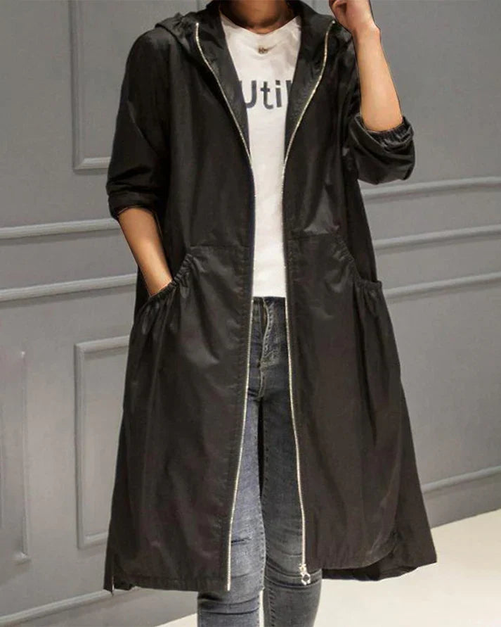 Comfortable long hooded jacket for women with zipper closure and front pocket