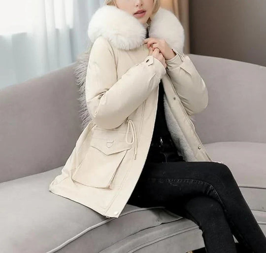 Comfortable & warm women's winter jacket with faux fur hood