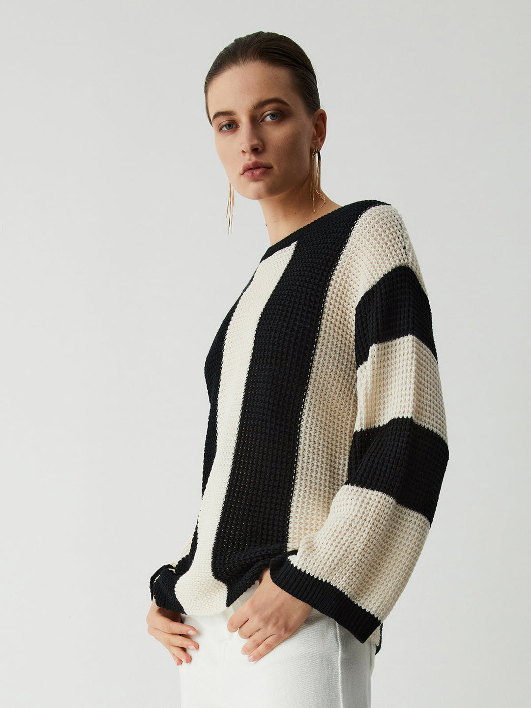 Elegant women's pointelle stripe sweater