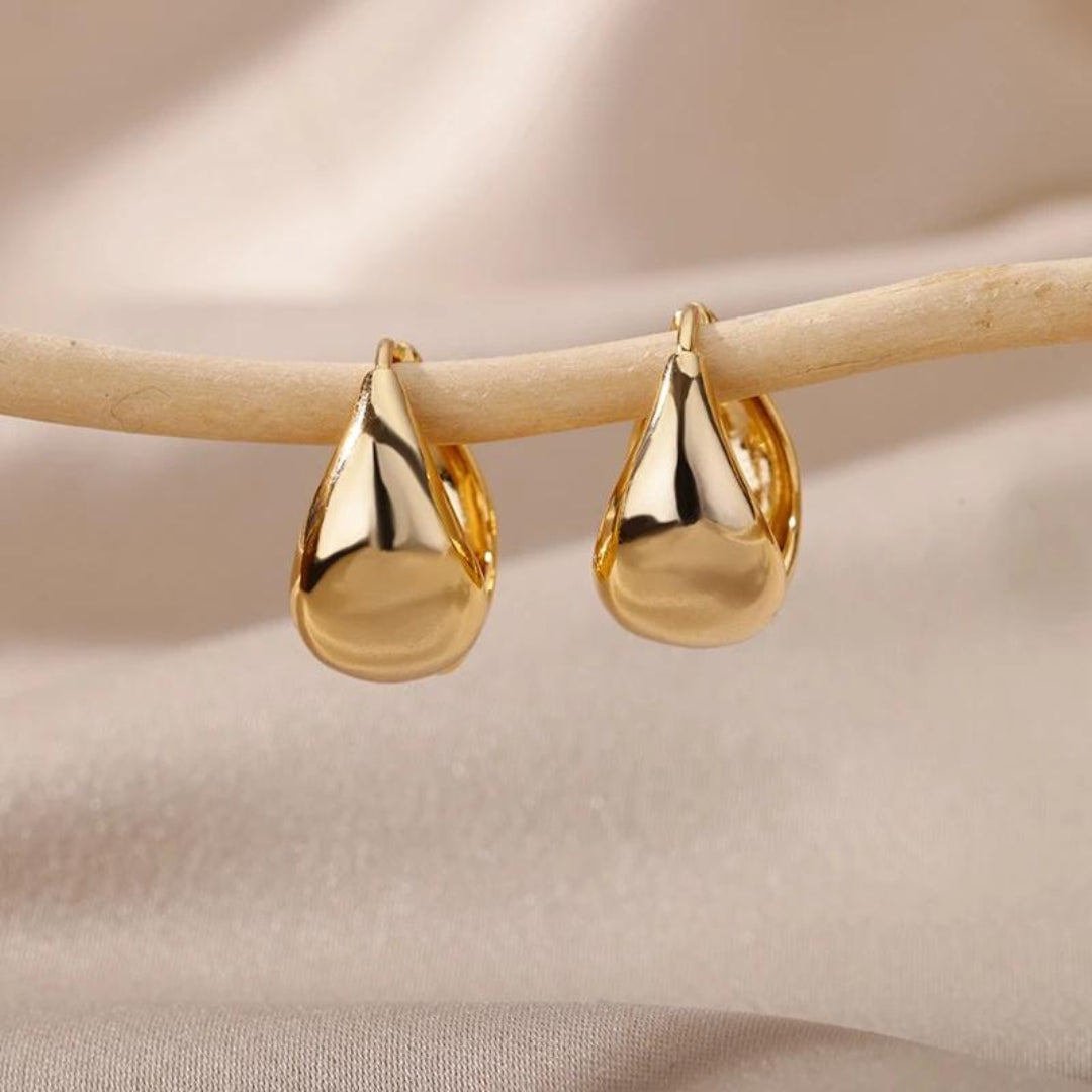 Elegant golden drop earrings with teardrop design