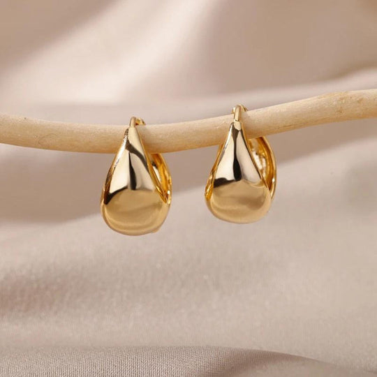 Elegant golden drop earrings with teardrop design