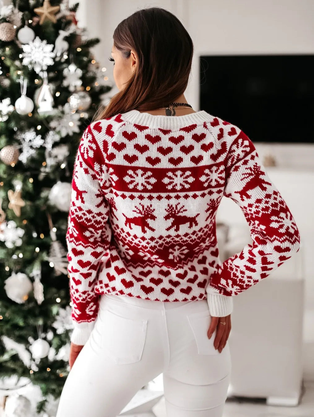 Women's reindeer and snowflake holiday sweater