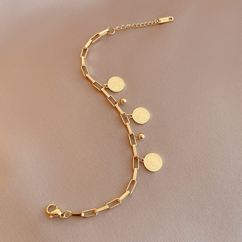 Adjustable coin bracelet