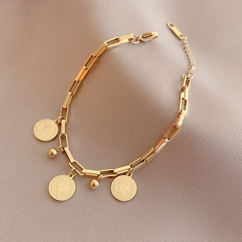 Adjustable coin bracelet