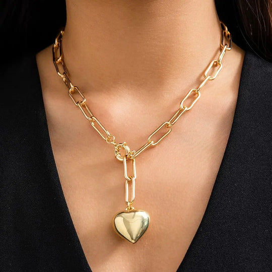 Gold and silver chunky chain necklace with heart pendant