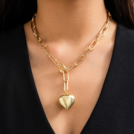 Gold and silver chunky chain necklace with heart pendant