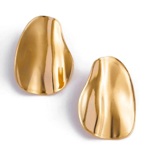 Abstract statement earrings with a sculpted metal design