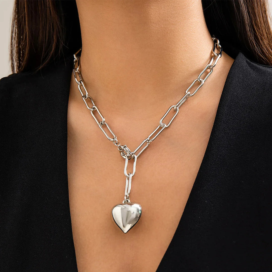 Gold and silver chunky chain necklace with heart pendant