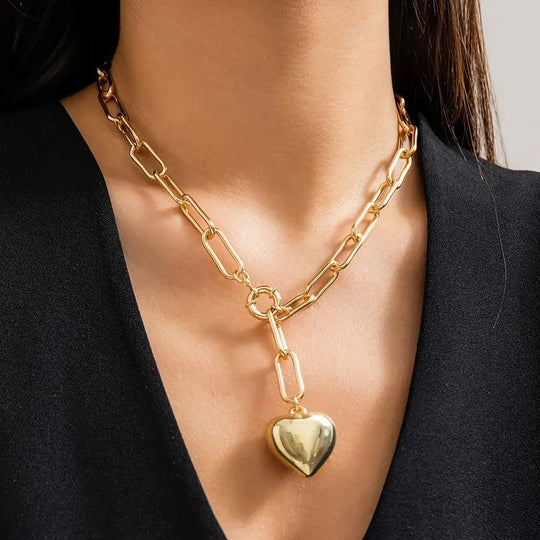 Gold and silver chunky chain necklace with heart pendant