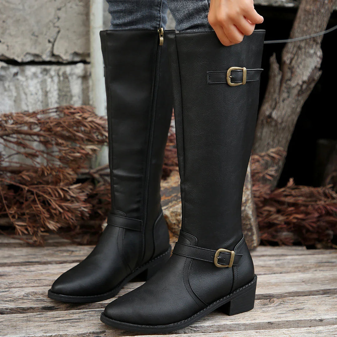 Knee-high riding boots with buckle strap and low heel for women