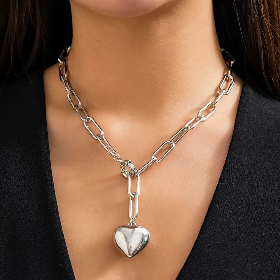 Gold and silver chunky chain necklace with heart pendant