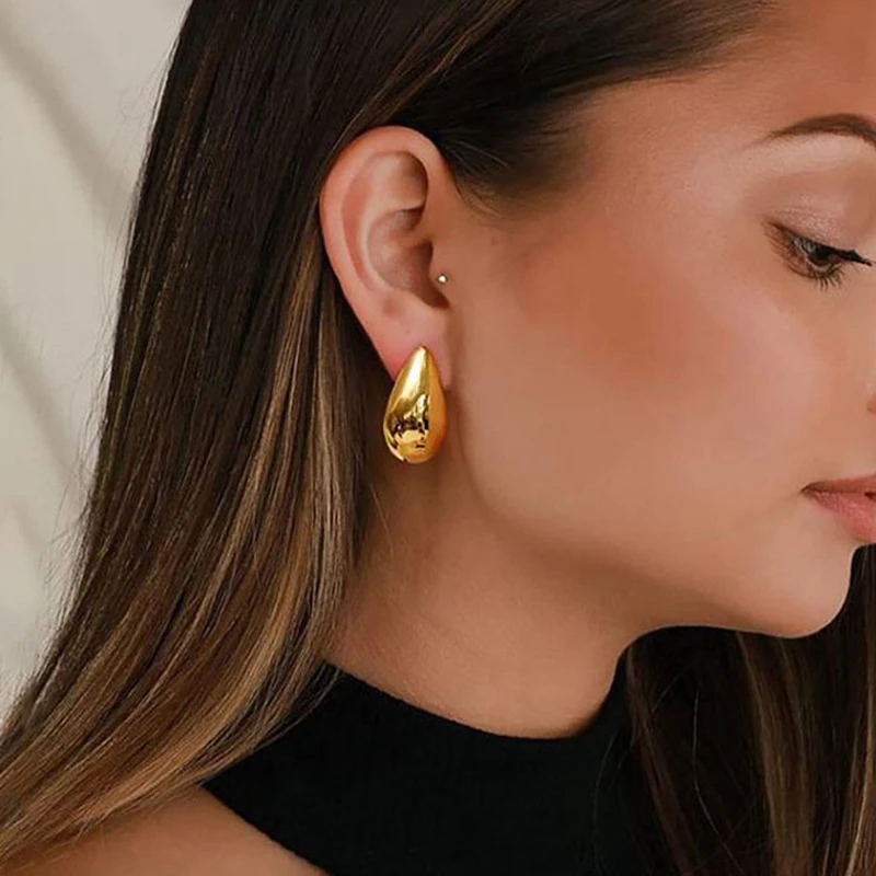 Elegant golden drop earrings with teardrop design