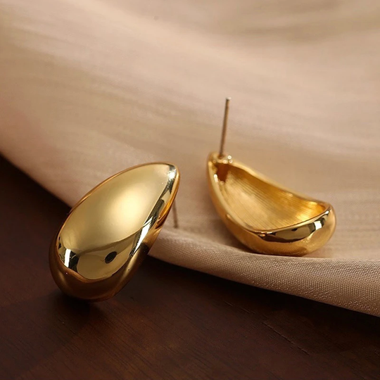 Elegant golden drop earrings with teardrop design